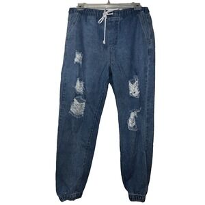 Fashion Nova Distressed Denim Joggers in Dark Blue